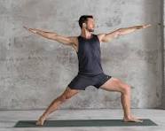 a young man is doing yoga