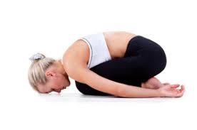 Woman is doing child pose