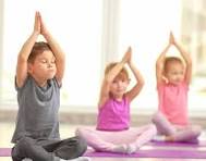 Children are doing yoga