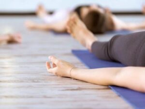 relaxing at yoga class